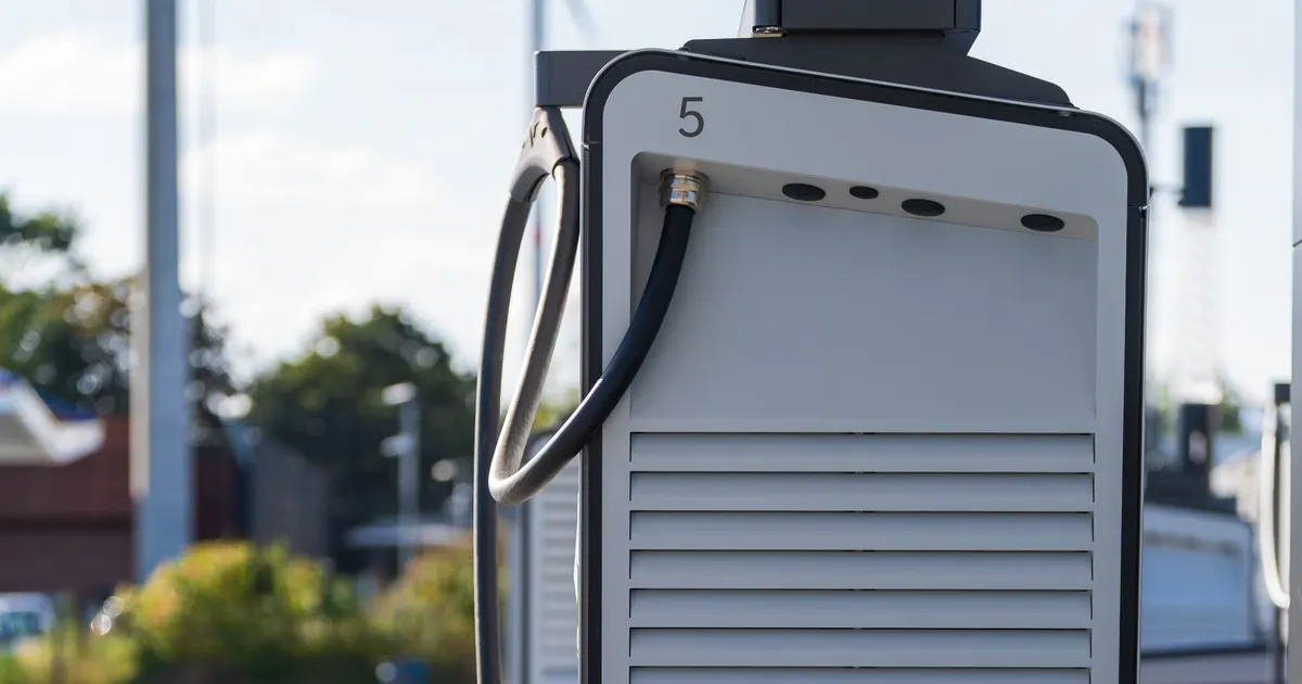 DC fast charger cabinet with a charging cable, an example of EV charger hardware
